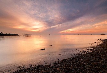 sunrise at Kudat, Malaysia. colourful sunrise sky with background. soft focus due to long expose.