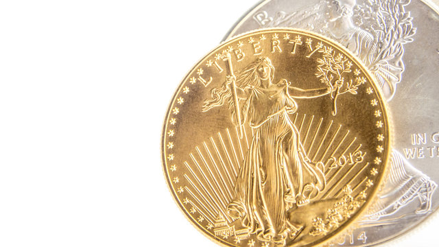 silver eagle and golden american eagle one ounce coins