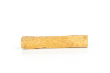 One whole dry brown cinnamon stick side view isolated on white background