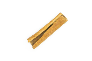 One whole dry brown cinnamon stick flatlay isolated on white background