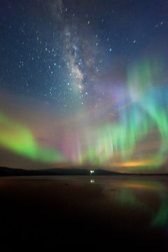 Milkyway with beautiful aurora Borealis. soft focus and noise due to long expose and high iso.