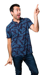 Naklejka premium Dancing brunette man on white background
