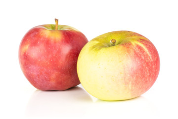 Group of two whole fresh red apple james grieve variety isolated on white background