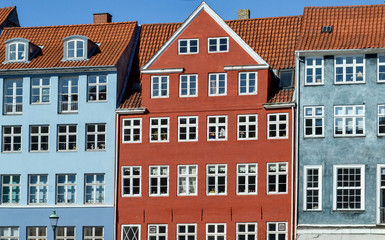 Facades of historic buildings in Copenhagen. Colorful houses