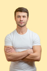 closeup vertical headshot of serious sporty man in casual clothes. personal fitness trainer