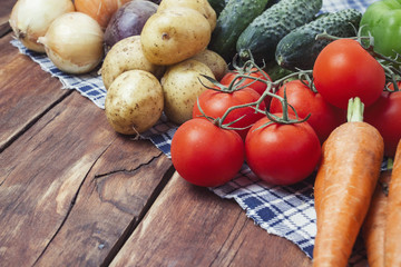Fresh organic farm vegetables, Health care, on a wooden backgrou