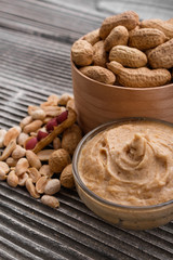 peanut paste on a wooden rustic background