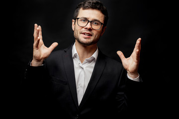 Emotional dialogue of a man in a fashionable clothes. close up portrait