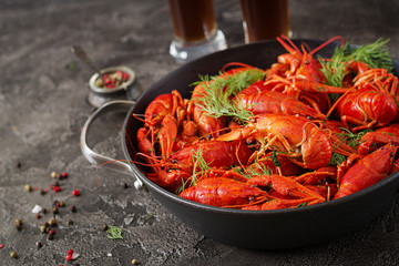 Crayfish. Red boiled crawfishes on table in rustic style, closeup. Lobster closeup. Border design