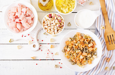 Ingredients for cooking creamy pasta with chicken and eggplant  served in deep plate. Italian food. Top view. Flat lay.