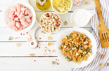 Ingredients for cooking creamy pasta with chicken and eggplant  served in deep plate. Italian food. Top view. Flat lay.