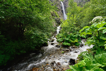 Gveleti Big Waterfalls being in a Dariali Gorge near the Kazbegi city in the mountains of the Caucasus, Geprgia