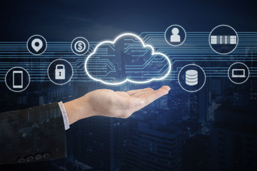 Double exposure of professional businessman presented Cloud technology and internet of things and...