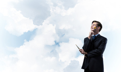 Inspiration of young creative businessman