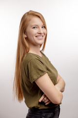a good looking female student wearing casual clothes. close up side view shot