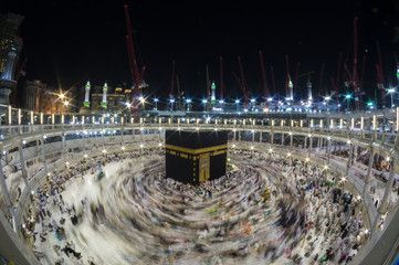 WIde angle view of Muslim pilgrims circumambulate the Kaaba counter-clockwise at Masjidil Haram in Makkah, Saudi Arabia.