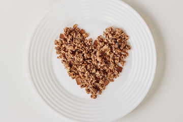 Cereal muesli breakfast on white background. Healthy eating and lifestyle concept