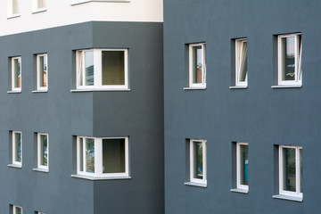 Fototapeta na wymiar The windows in new modern residential building.