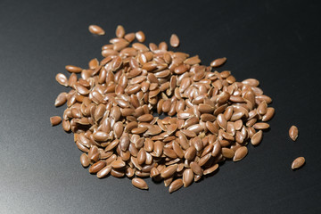 flax seeds on black