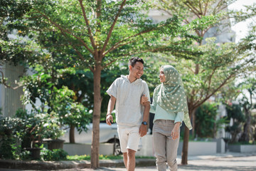 Fototapeta na wymiar muslim couple walk together