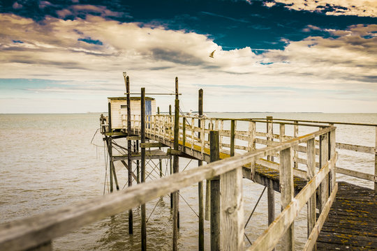 Boardwalk out to a fishing hut, Royan France