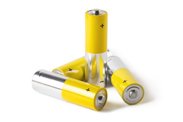 Close-up of four AA batteries, isolated on white background