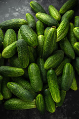 Freshly picked organic cucumber harvest. background, texture.