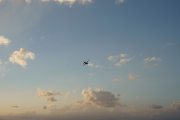 View of a plane gliding in blue sky