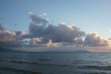 View of clouds over the sea at sunset time