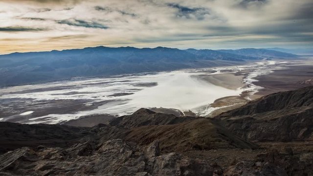 Motion time lapse from Dante's View of the sun setting over the salt beds of Death Valley National Park in California