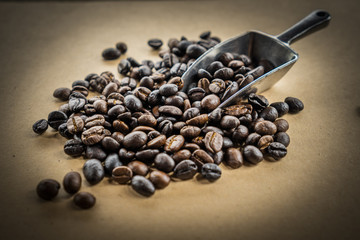 coffee beans with metal scoop