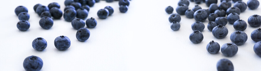 Blueberries and cranberries, berries on a white background. Berry light background.