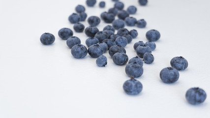 Blueberries and cranberries, berries on a white background. Berry light background.
