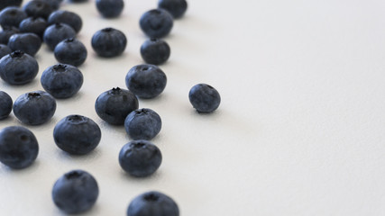 Blueberries and cranberries, berries on a white background. Berry light background.