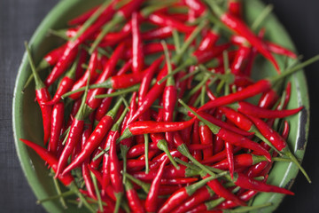 rustic red bird eye chilies defocused