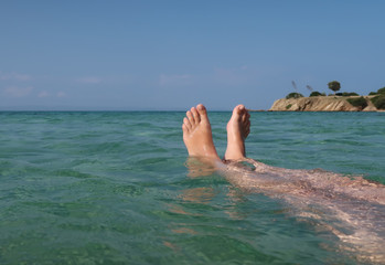 Feet up in the sea