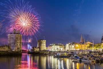 Fireworks at La Rochelle during French National Day - obrazy, fototapety, plakaty