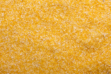 raw Italian corn porridge polenta on a white background