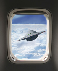 Naklejka na ściany i meble UFO-Sichtung aus Flugzeugfenster
