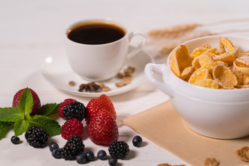 Variety of fresh berries and cereal for breakfast