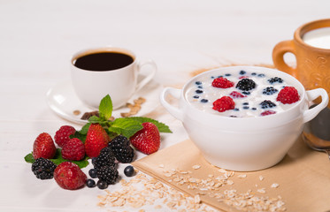 Tasty morning meal with cereal and berries