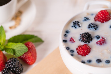 Healthy breakfast with cereal topped with berries