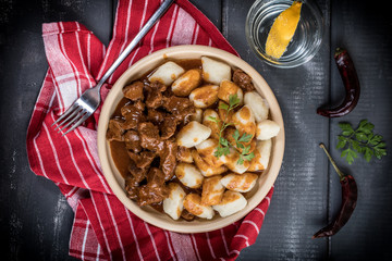 Beef stew with potatoes dumplings.