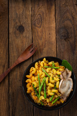 tom yam soup pasta on wood