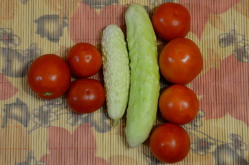 
White cucumbers and red tomatoes are triangular.