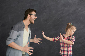 Father and daughter arguing and screaming