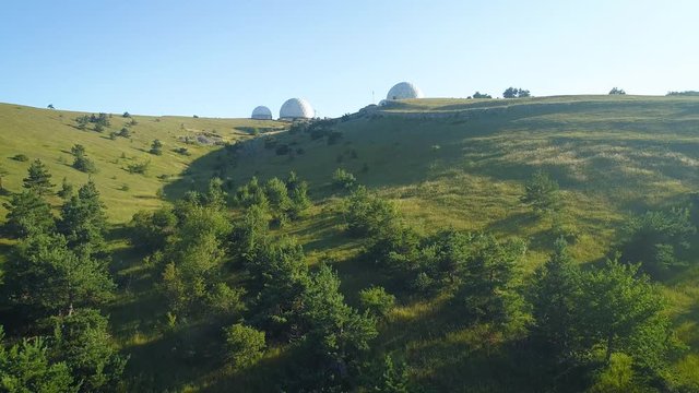big white balls on the mountain. Observatory in Russia. Used to measure weather and radionavigation.
