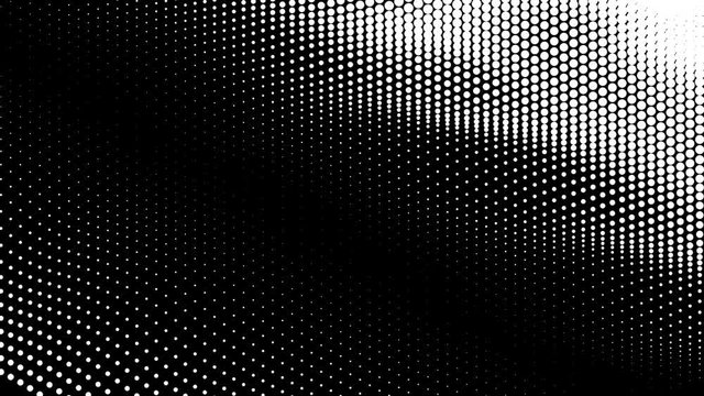 White wavy surface of scaling dots on a black background loop