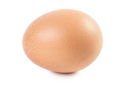 Close-up view of a brown egg with freckles, isolated on white background