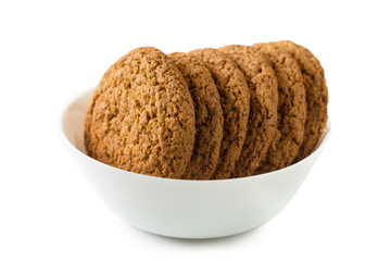 Oatmeal cookies in a plate, isolated on white background